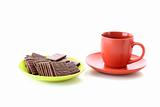 Chocolate cookie and cup of coffee isolated on white