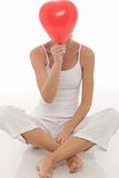 young beautiful caucasian woman with balloon