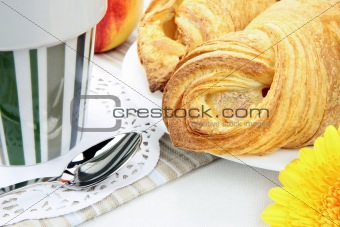 Fresh croissant & more on breakfast table