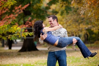 Man Holding Woman