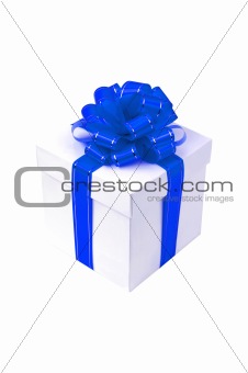 White box with blue bow isolated on white