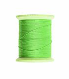 Bright green thread isolated on white