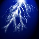 Electric flash of lightning on a dark blue background 