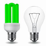 energy saving green light bulb and classic light bulb
