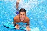 boy teenager surfboard splashing blue water