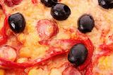 Pizza with olives closeup
