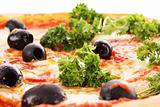 Pizza with olives and green salad