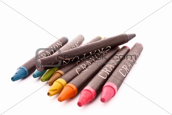 Different color crayons isolated on white