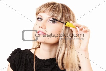 Young woman makeup with mascara isolated on white