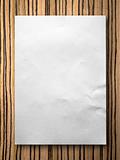 White blank paper on zebrano wood