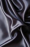 Smooth elegant black silk as background