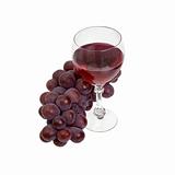 Red grapes and glass with wine