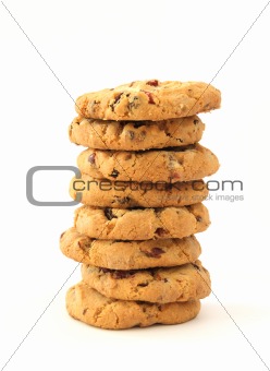 Stack of hazelnut cookies with chocolate and cranberies