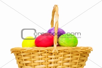 Easter concept with eggs and basket on white
