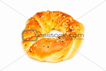 Doughnut with poppy-seeds isolated on the white