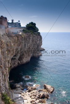 Sea of Sicily; Taormina seascape with steep rocky cliffs