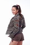woman with brown hair in shorts and streetware jacket - isolated on white 