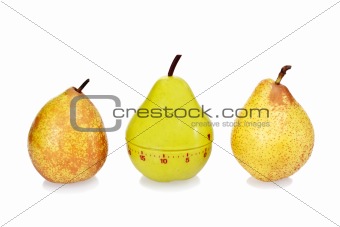 Two ripe fresh pears and green plastic pear timer