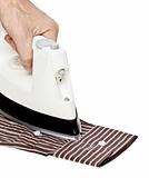 Male hand ironing shirt