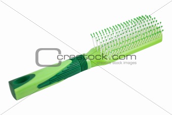 Green plastic massage comb