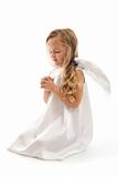 Little angel girl praying