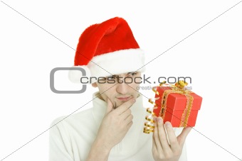 The thoughtful man with gift in hand