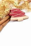 Red Christmas tree ornament and cinnamon sticks
