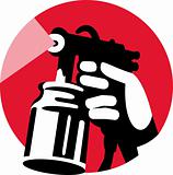 Spray gun with hand holding icon