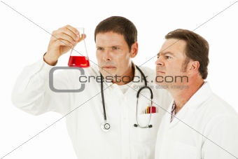 Doctor Examines Medical Specimen 