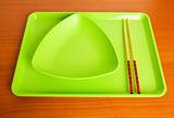 Asian food concept with plate and chopsticks