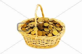Basket full of coins isolated on white