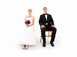 Married couple sitting over white background