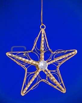 Christmas Tree Star Ornament on Blue