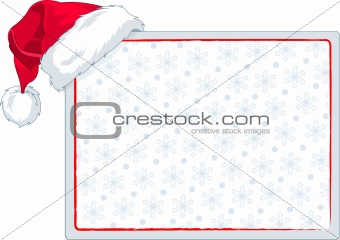 Santa's cap hanging on a blank place card