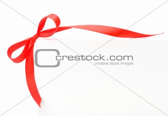 red satin ribbon on white background