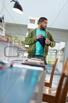 student stealing laptop in library