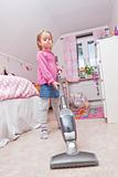 Young Girl with a vacuum cleaner