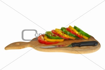 Cutting board with sliced  bell pepper and knife