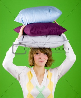 woman with pillows stack