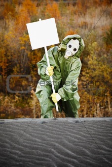 Scientist in gas mask with poster