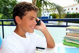 Boy teen talking mobile phone smiling student