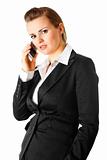 pensive modern business woman  with mobile phone
