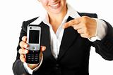 smiling modern business woman pointing  finger on  mobile phone
