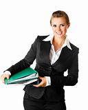 smiling modern business woman  holding folders  with  documents
