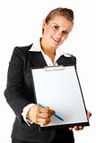 smiling modern business woman with documents and pen for your signing
