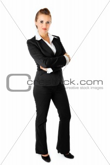 full length  portrait business woman with crossed arms on chest
