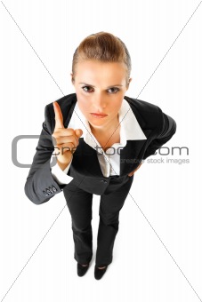 strict modern business woman shaking her finger
