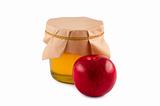 Honey, jar, wooden spoon, red apple isolated.