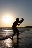 Father and Baby on Beach at Sunrise