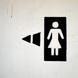 black and white woman toilet sign